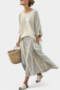 Aurora — Blusa comoda e gonna midi a righe