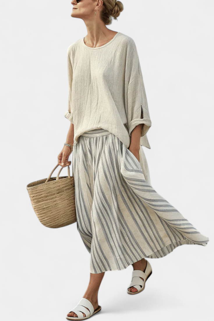 Aurora — Blusa comoda e gonna midi a righe