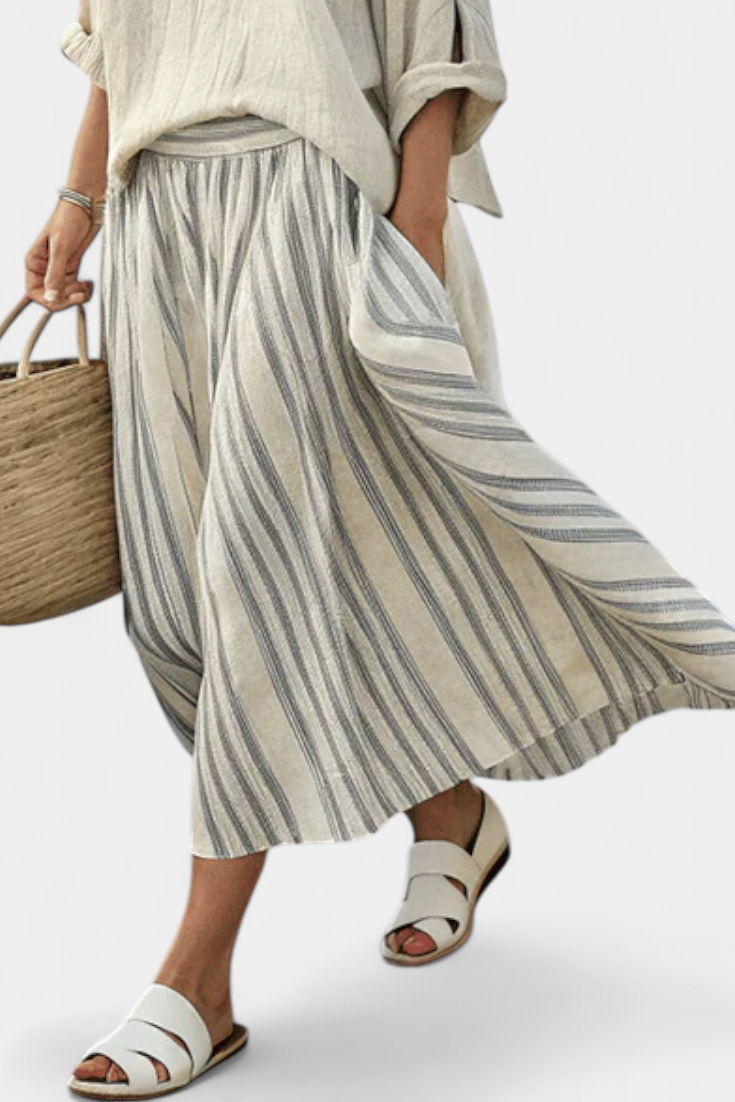Aurora — Blusa comoda e gonna midi a righe