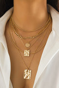 Collana con ciondolo geometrico a catena in metallo