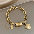 Bracciale grosso con cuori | Dorato