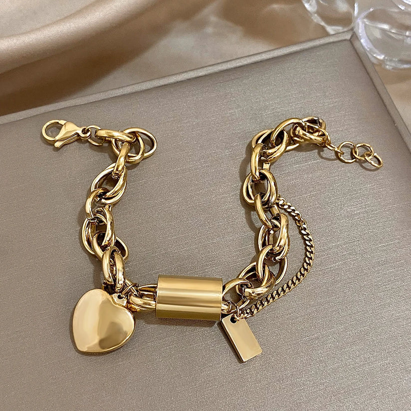 Pulsera gruesa con corazones | Dorado
