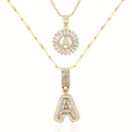 Set di collana con iniziale in pavé | Oro